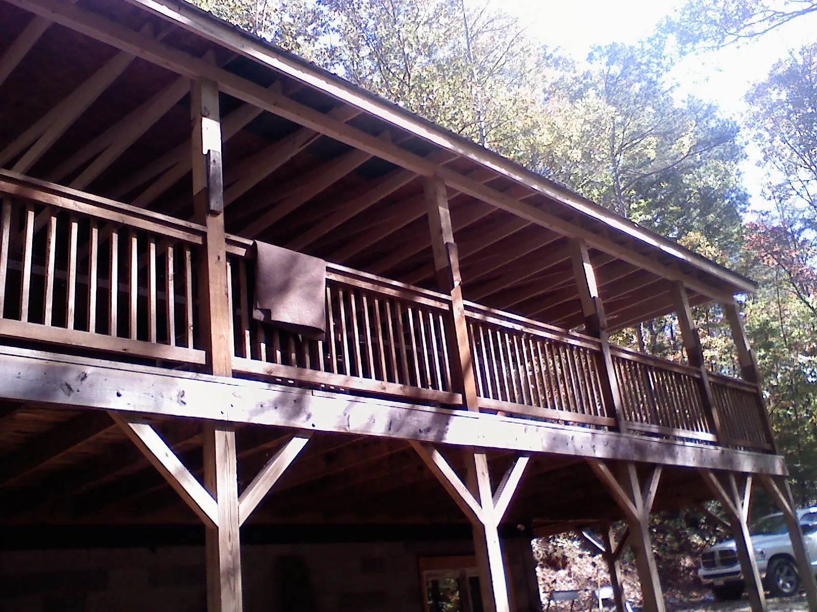 Timber framing under a new elevated porch and deck — Roof Leak Repair in Leasburg by Roofing Brothers